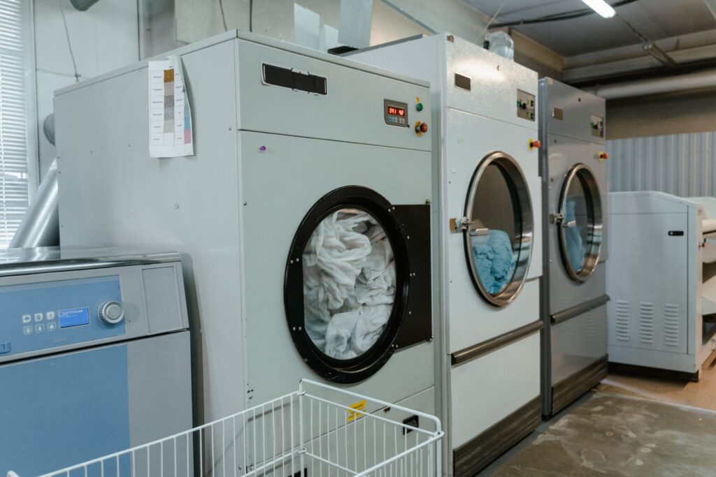 Row of dryers in a laundromat